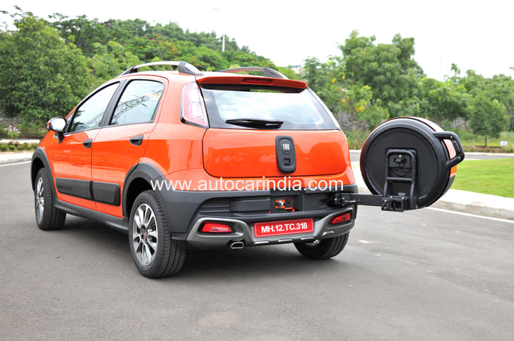 Cleverly engineered spare wheel mount is hinged onto the rear bumper.